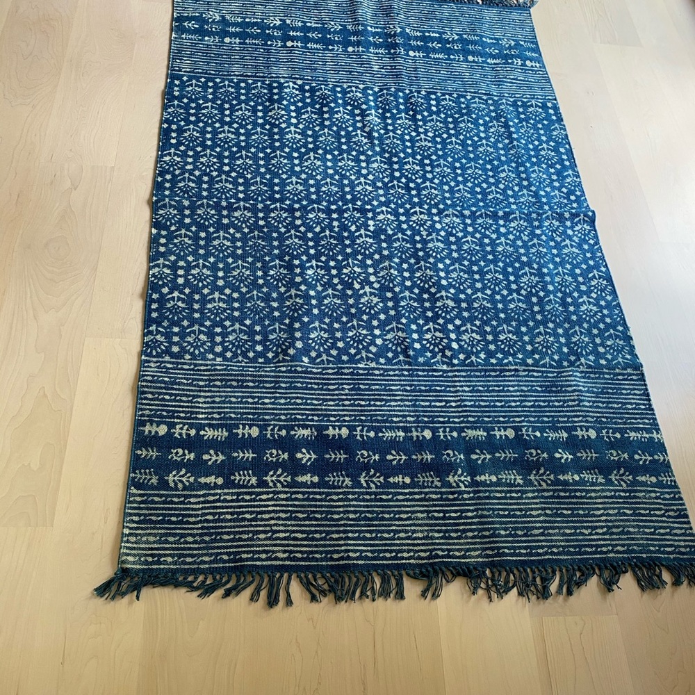 Hand printed indigo area rug
